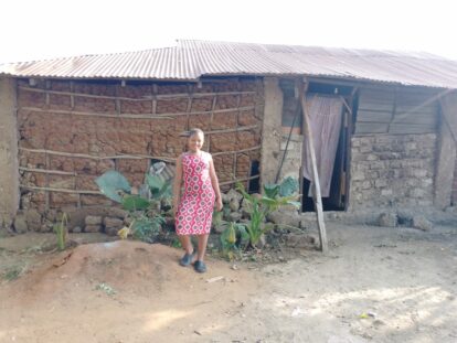 New student Faith outside her home
