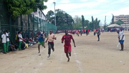 The boys running a race barefoot