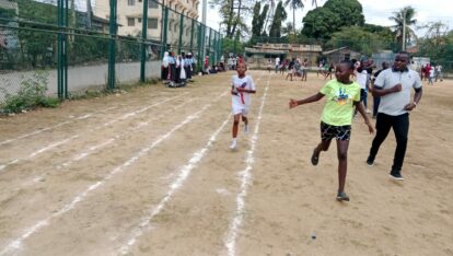 Local schools sports day - Bombolulu Educational Centre student running a longer race