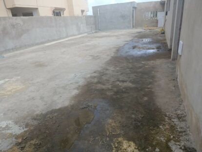 The roof of the school in Bombolulu showing water puddles and work to be done